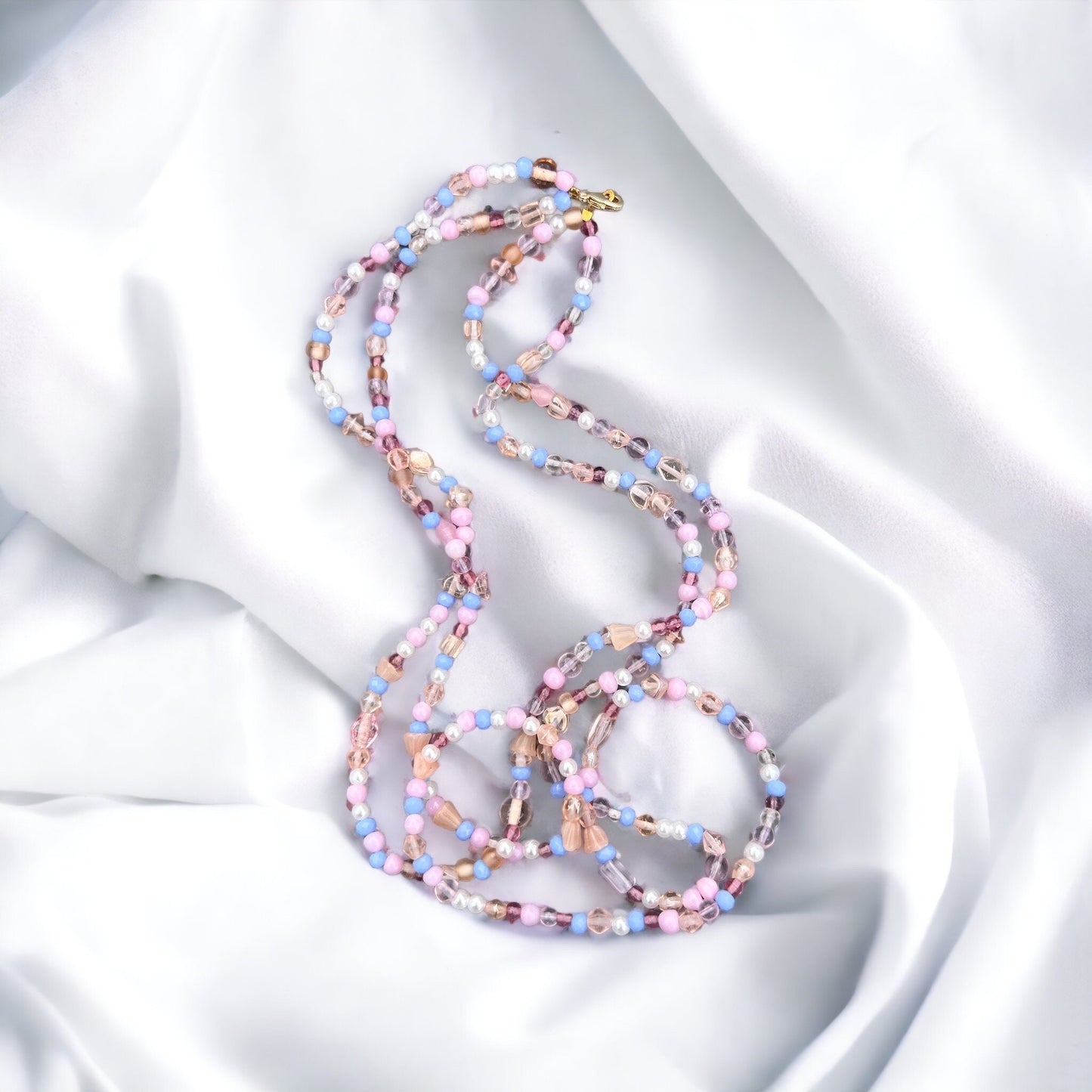 Purple, white, pink, gold beaded necklace