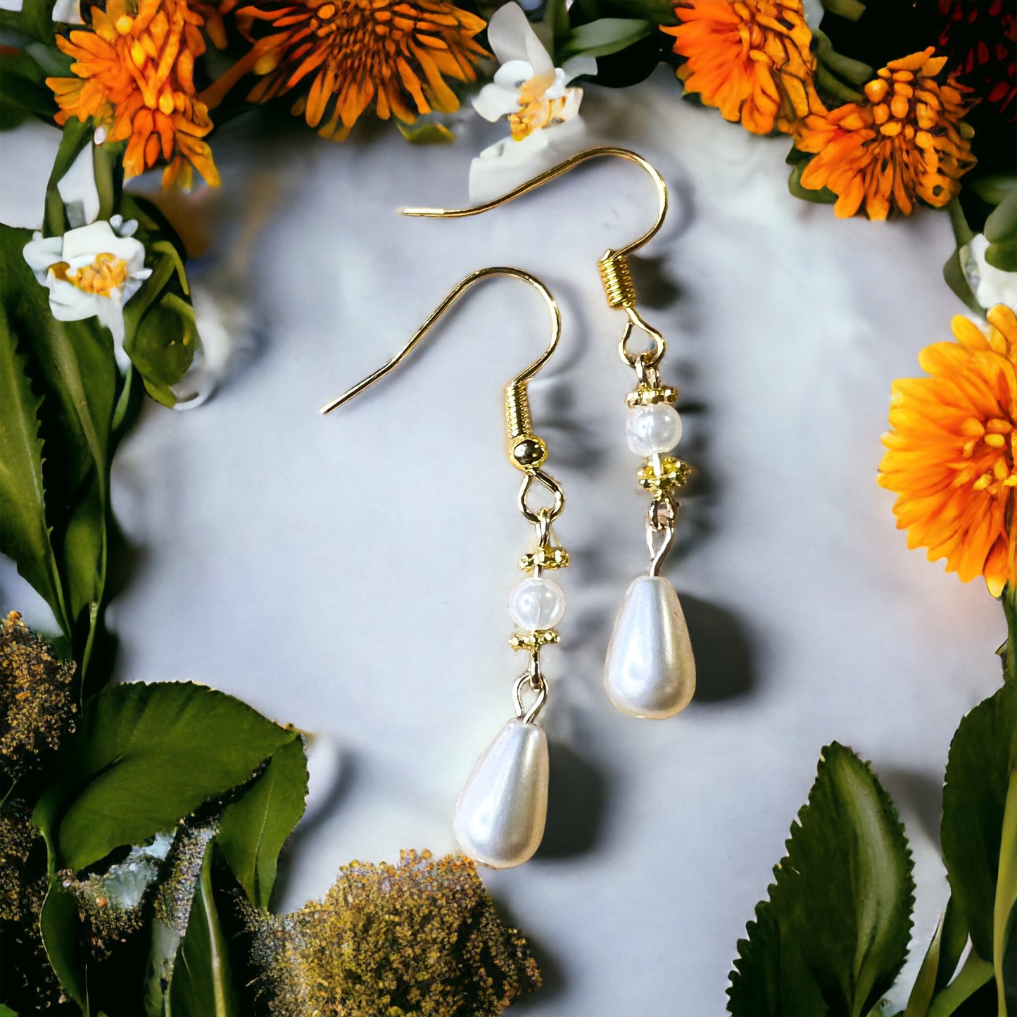 Gold pearl earrings