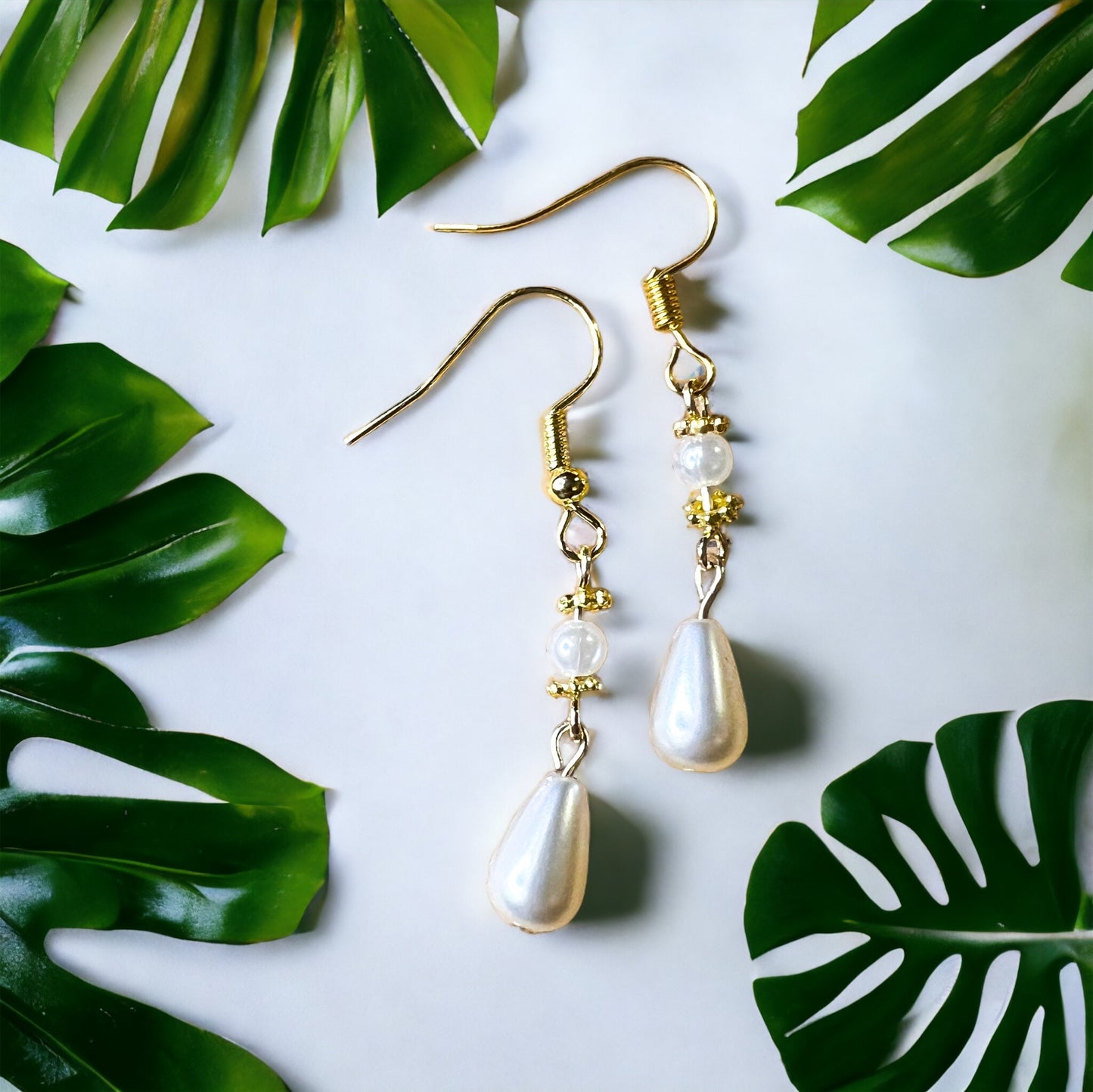 Gold pearl earrings