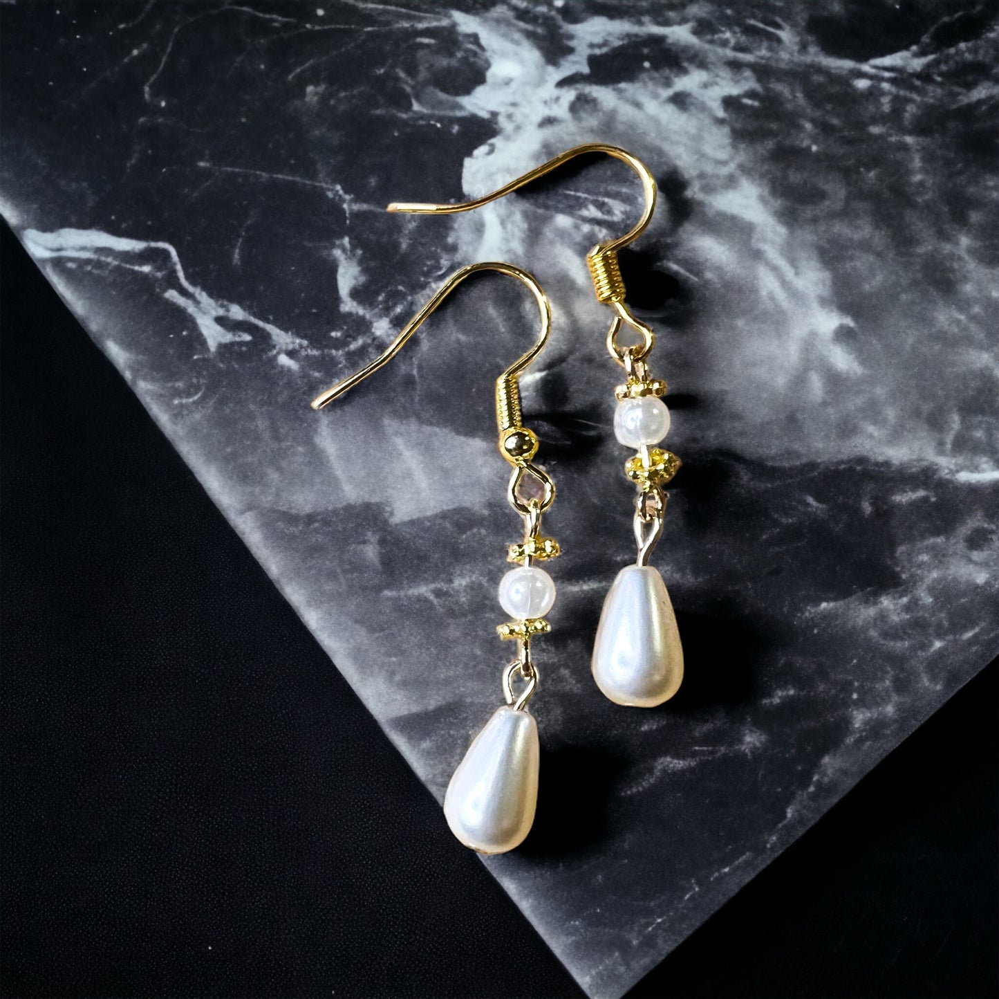 Gold pearl earrings