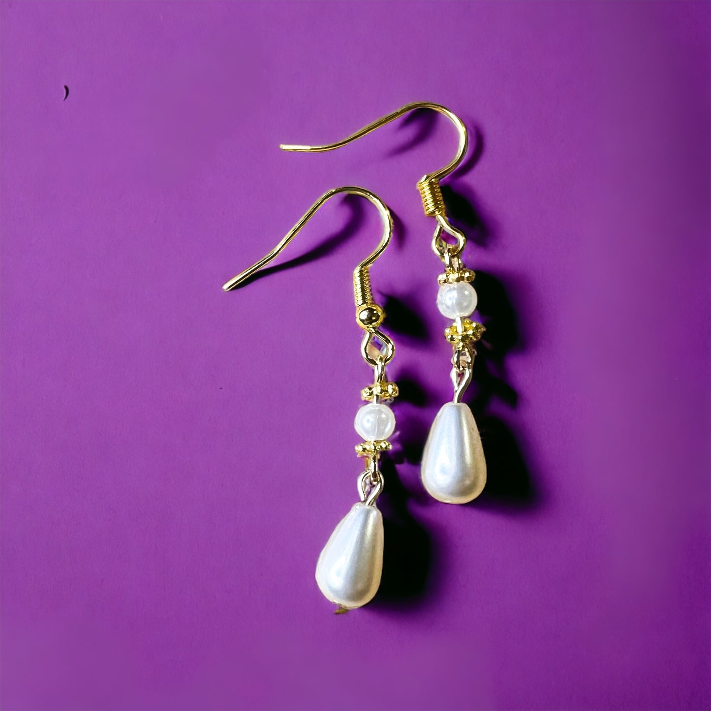 Gold pearl earrings