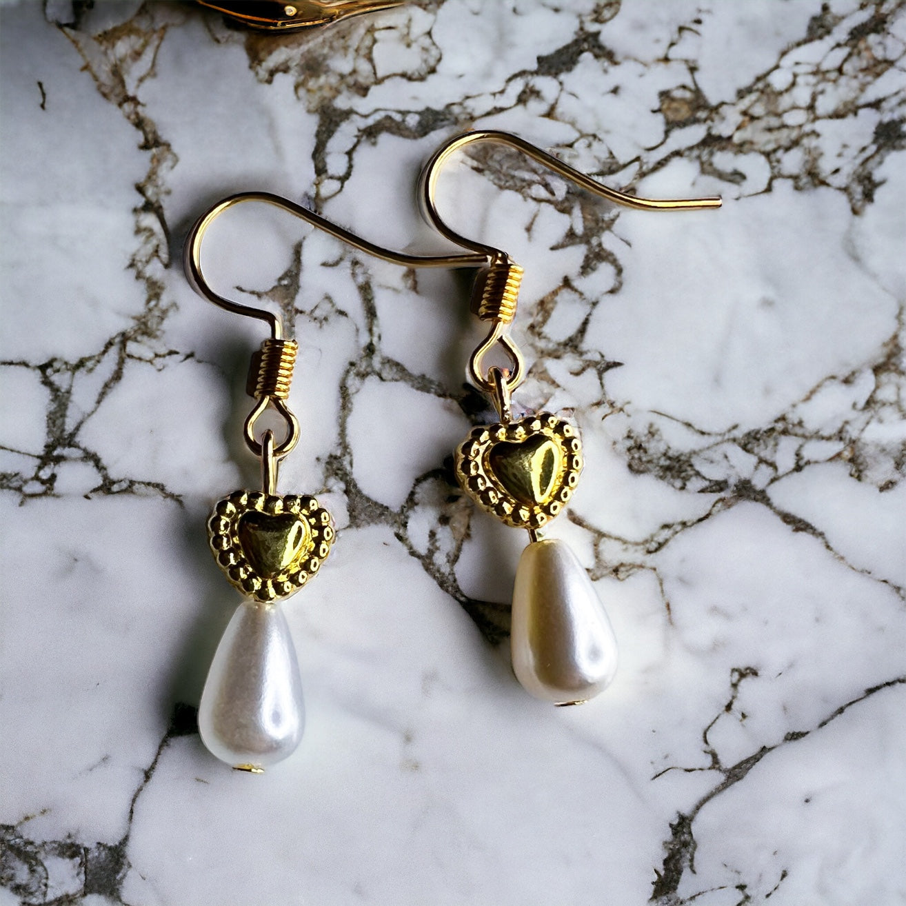 Gold pearl heart earrings
