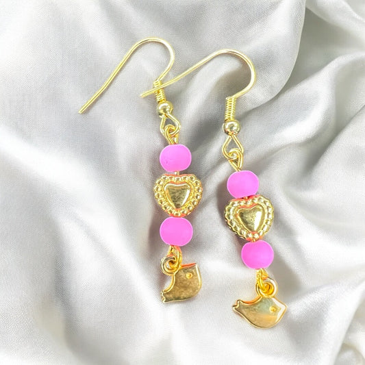 Roze gouden oorbellen met vogel hangers