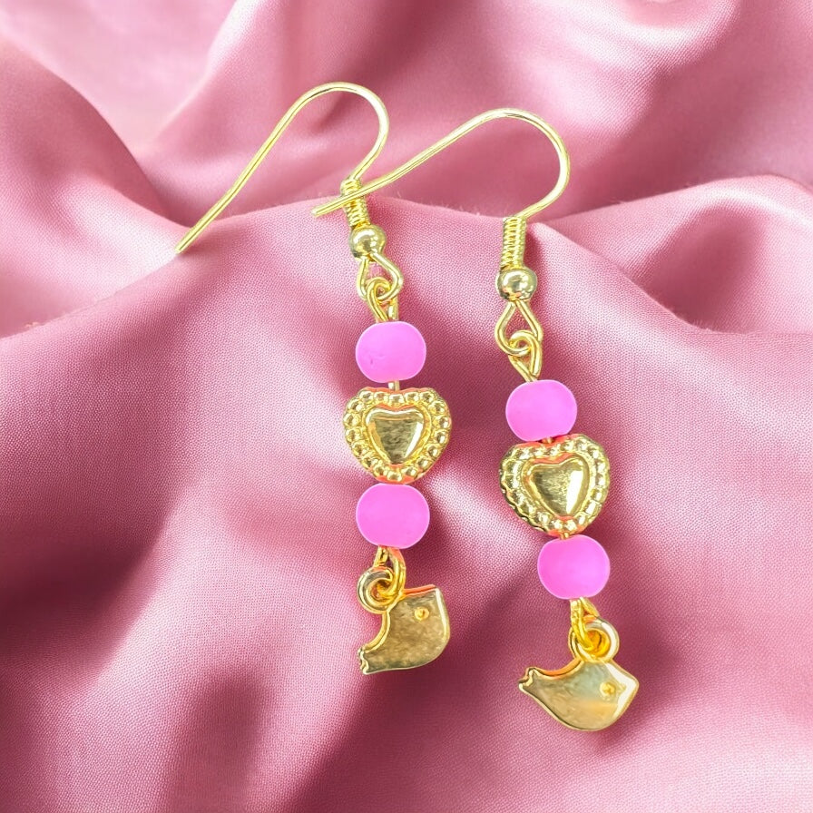 Roze gouden oorbellen met vogel hangers