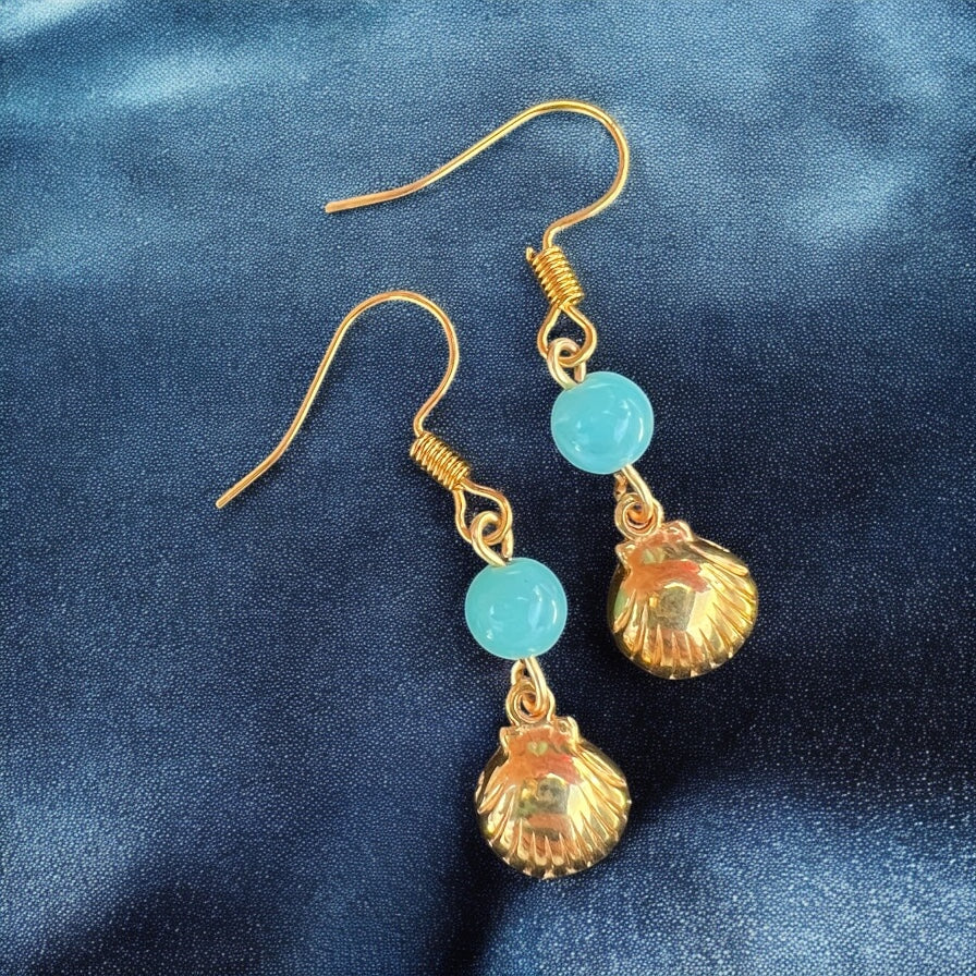 Gouden schelp oorbellen
