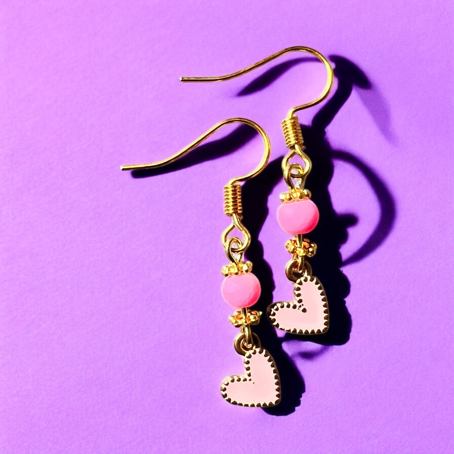 Pink gold heart earrings