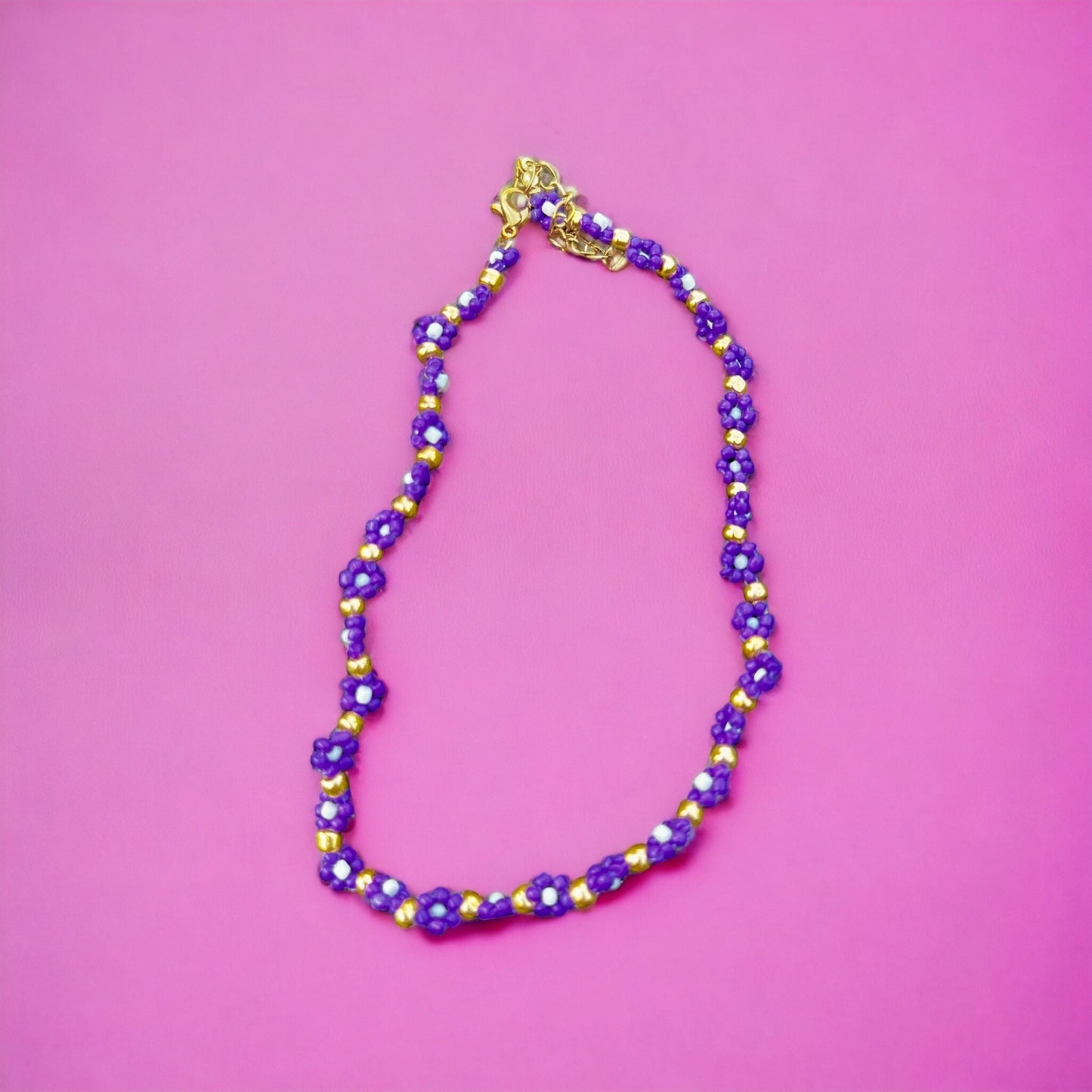 Purple white and gold flower necklace