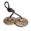 Tibetaanse Tingsha Ohm met lotus (200g, 6cm)