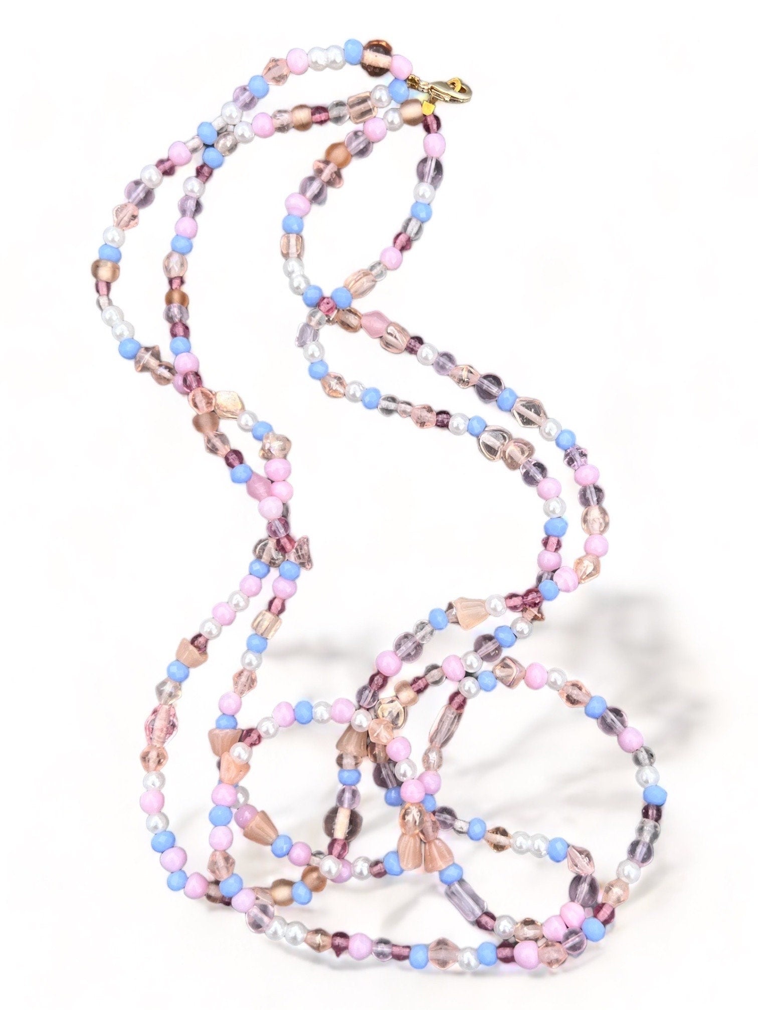 Halskette mit Perlen in Lila, Weiß, Rosa und Gold