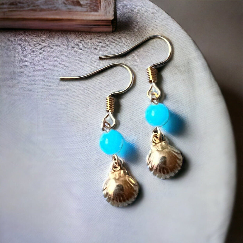 Ohrringe mit goldenen Muscheln von KEY LIME STORE