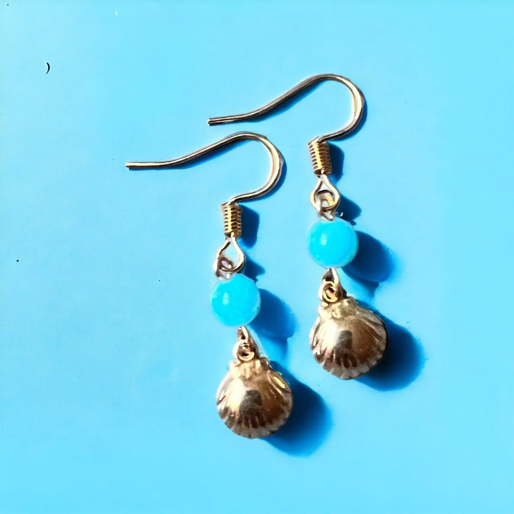 Ohrringe mit goldenen Muscheln von KEY LIME STORE