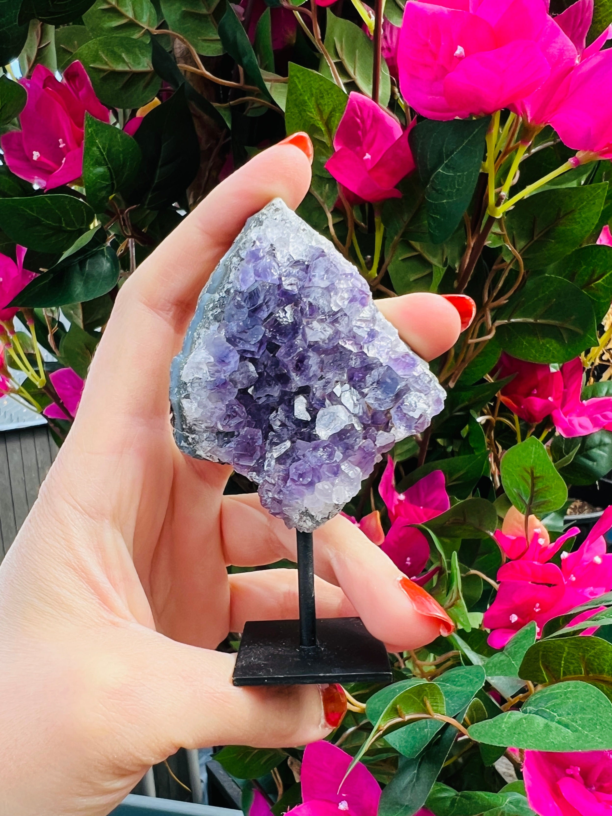 Amethyst crystal cluster on stand