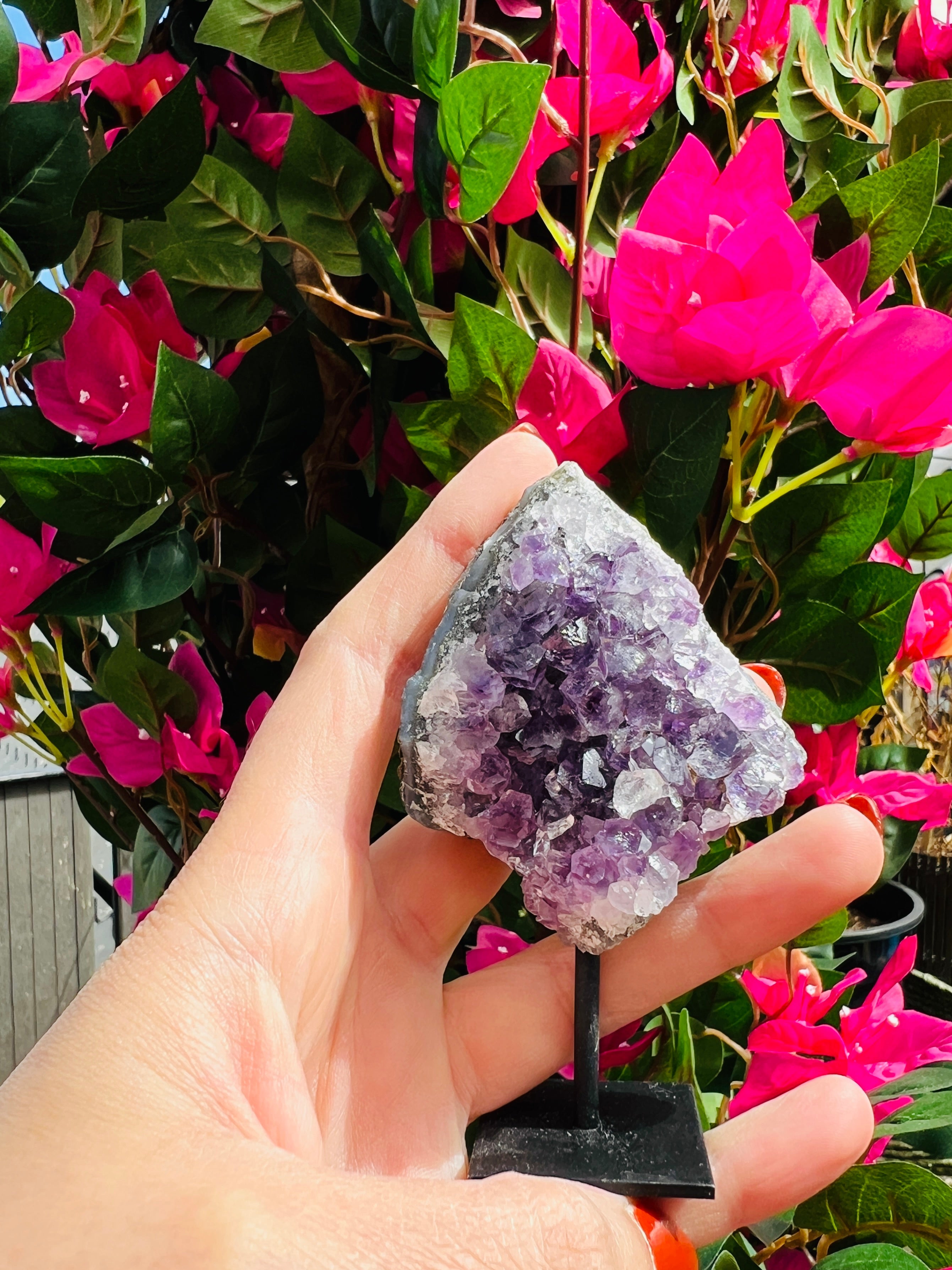 Amethyst crystal cluster on stand