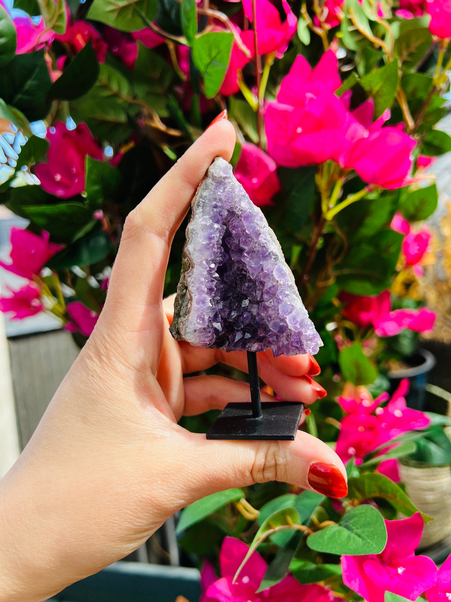 Amethyst crystal cluster on stand