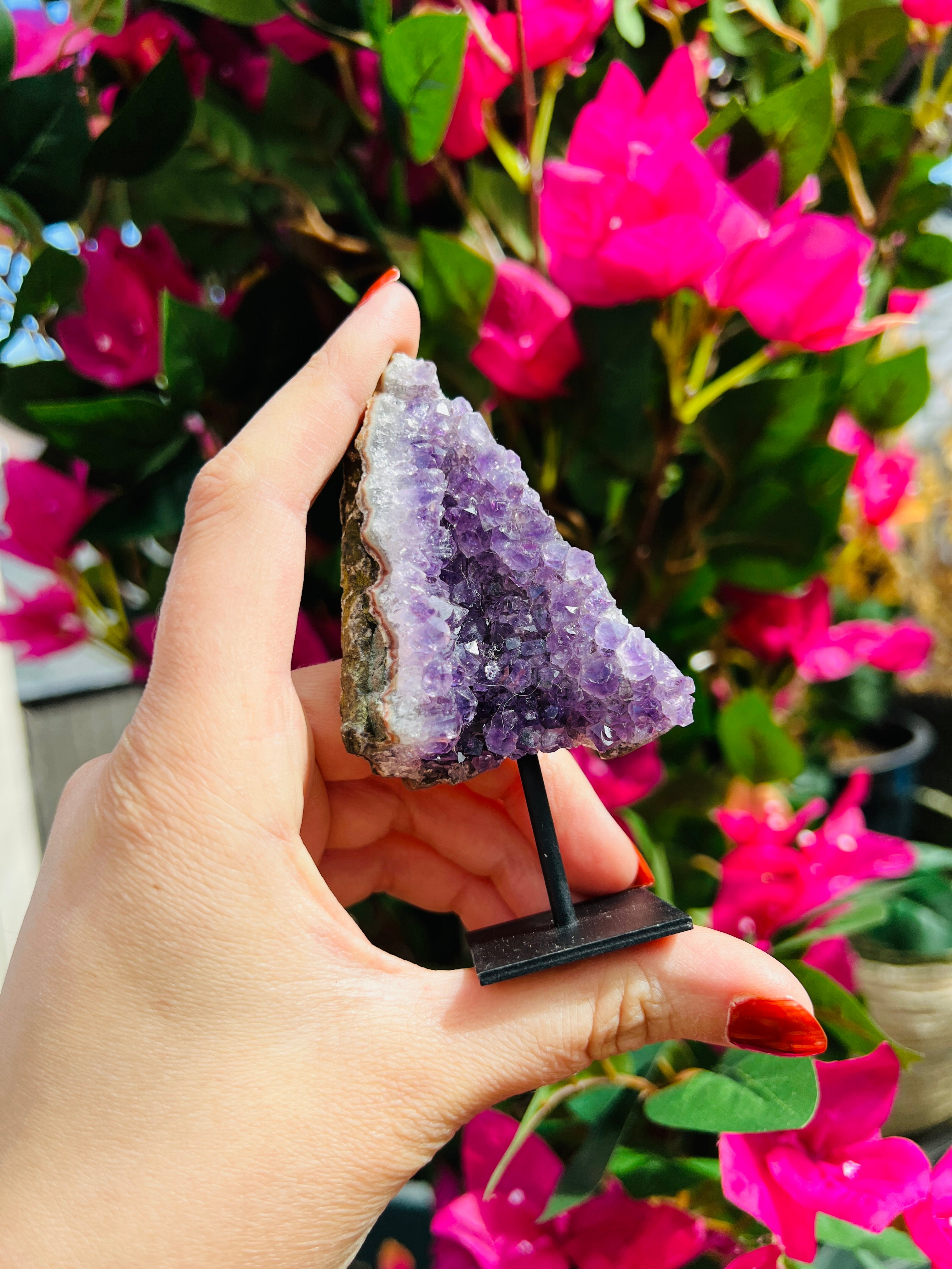 Amethyst crystal cluster on stand