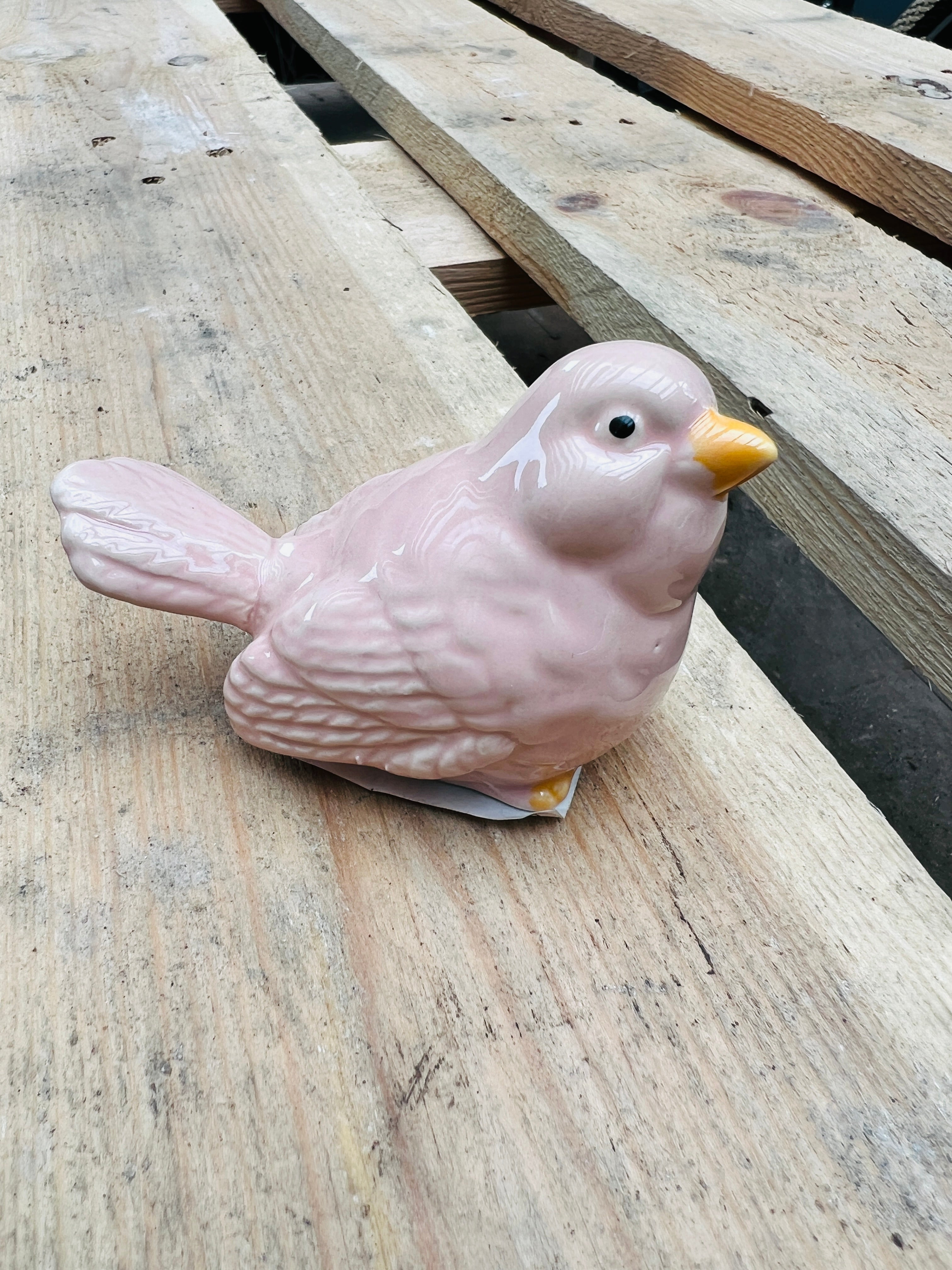 Beeldje vogel roze