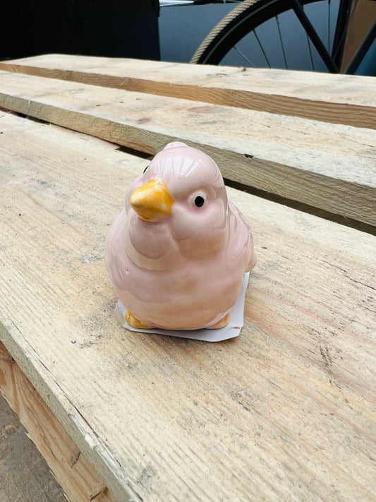 Beeldje vogel roze