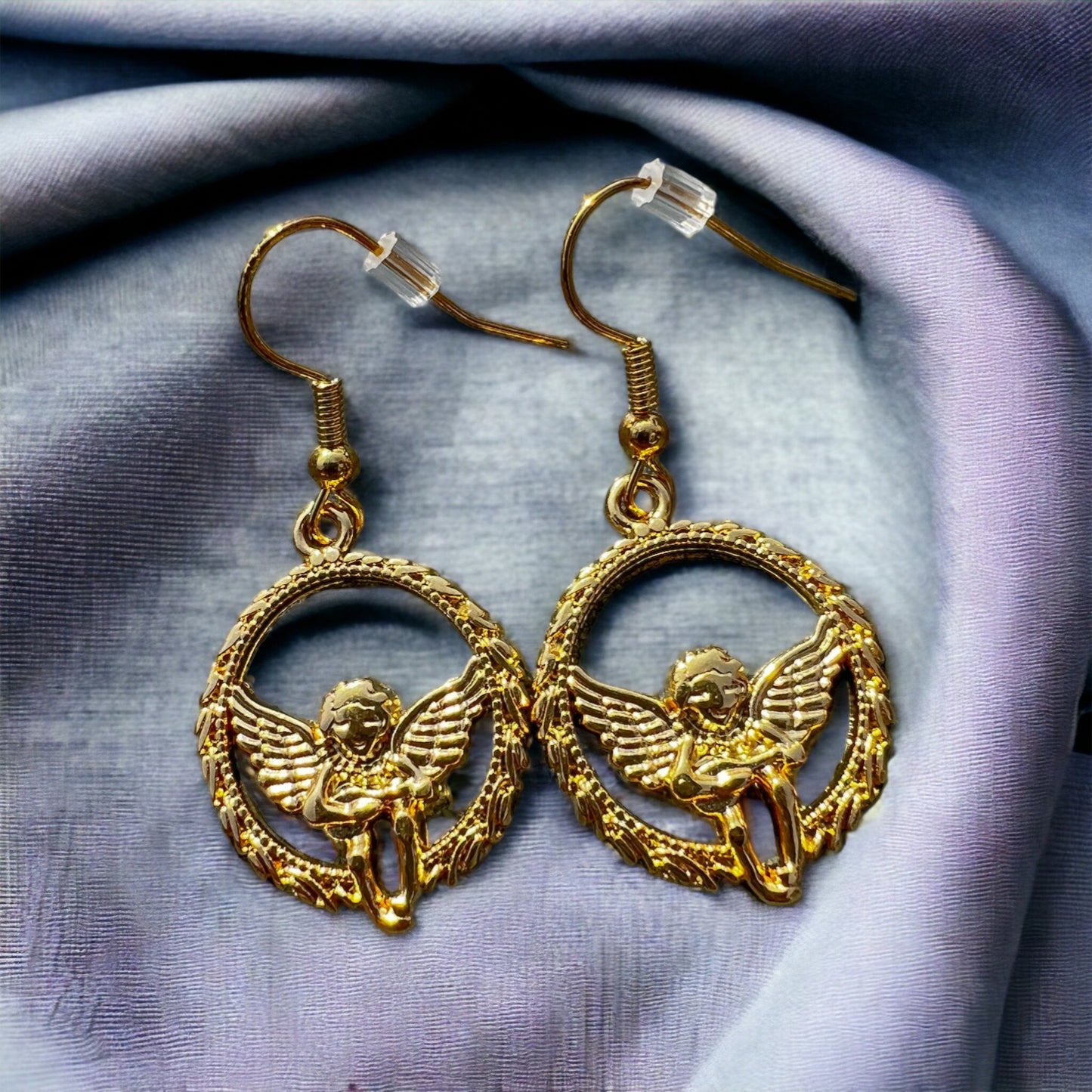 Gold angel earrings
