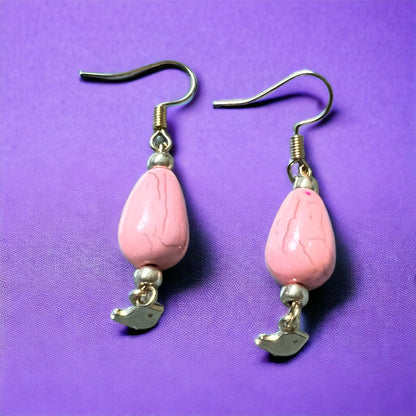 Pink gold bird pendant earrings