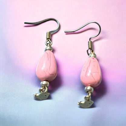 Pink gold bird pendant earrings