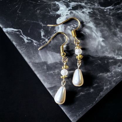 Gold pearl earrings