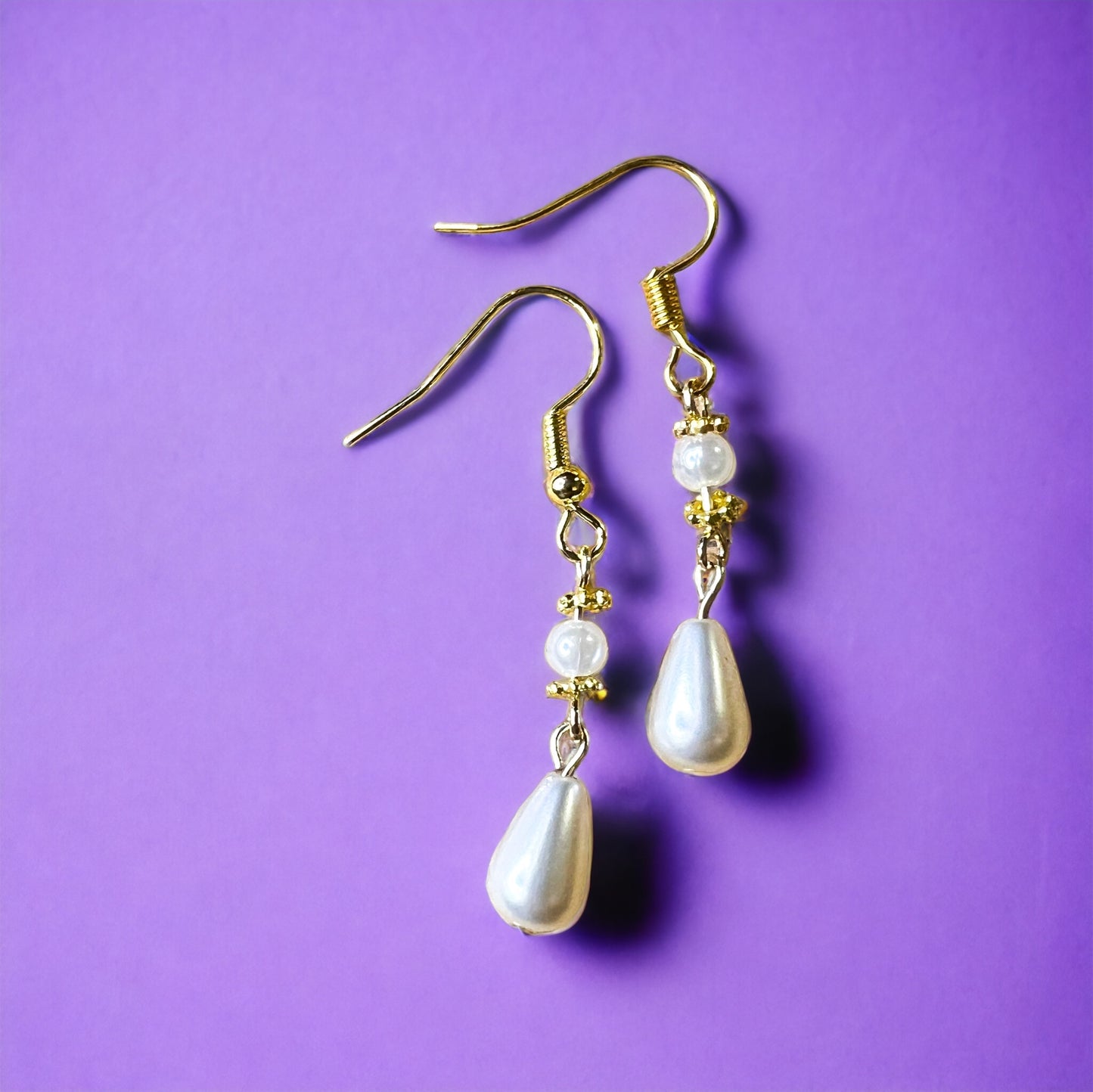 Gold pearl earrings