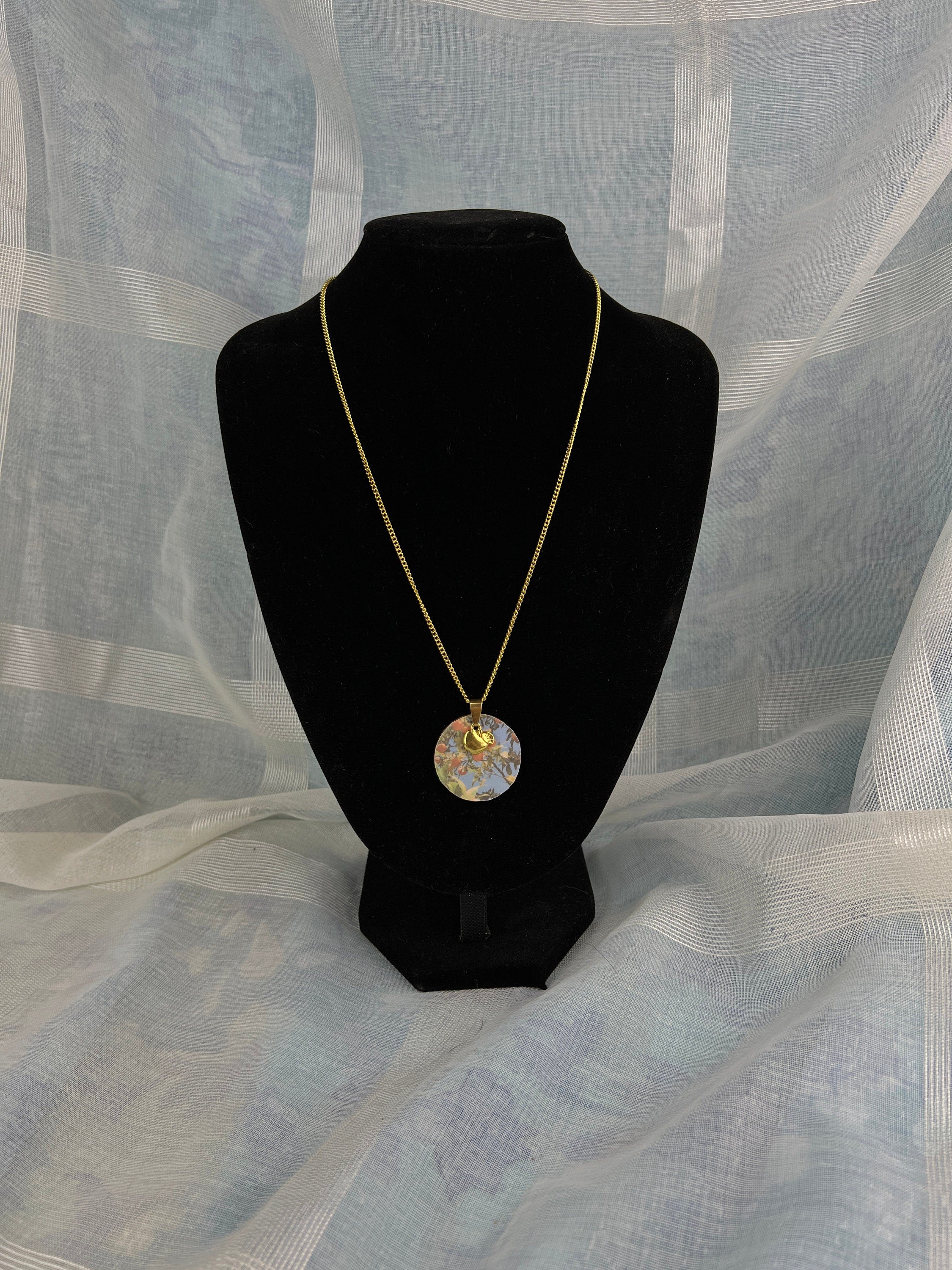 Stainless steel gold chain with gold apple pendant and apple tree pendant